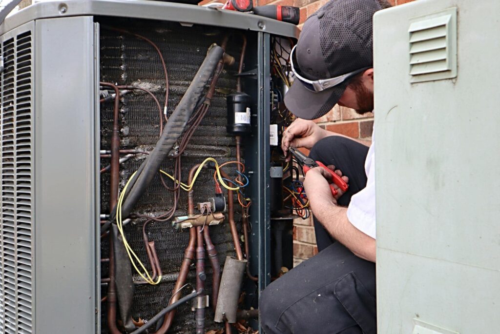 technician doing an ac repair