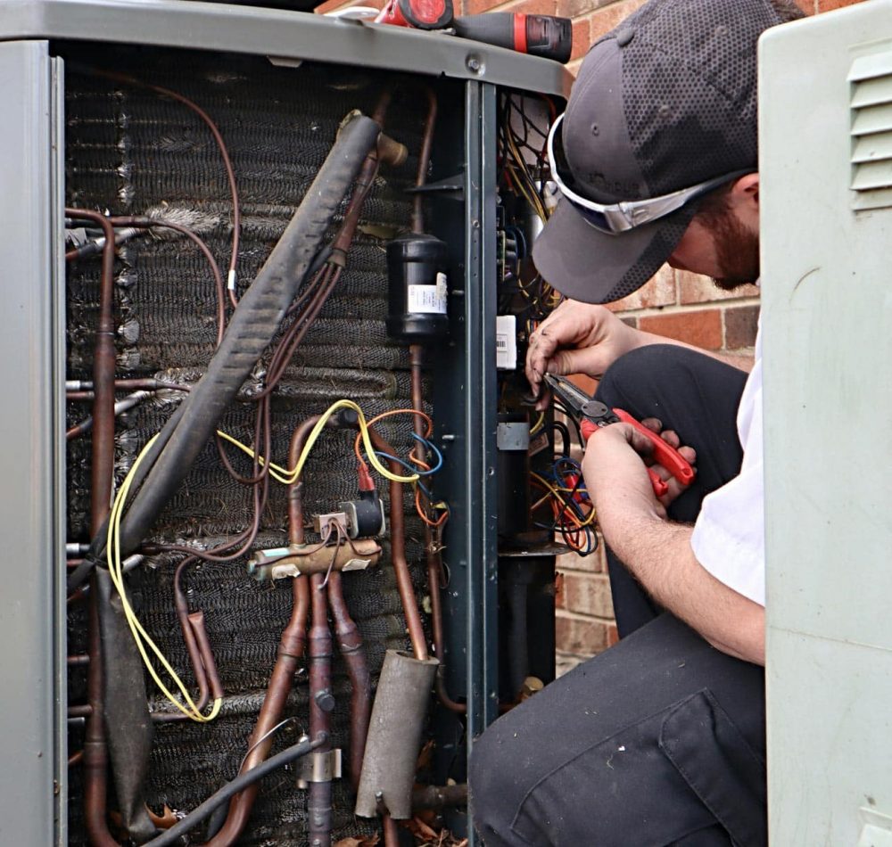 technician doing an ac repair